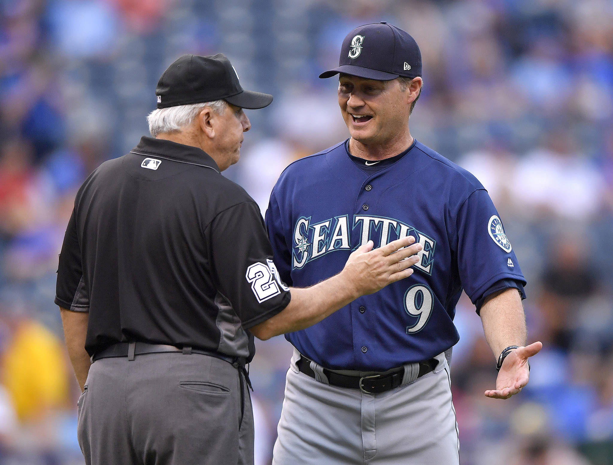 John Sleezer |Kansas City Star/TN                                Seattle Mariners manager Scott Servais tries to argue with umpire Larry Vanover during a game in 2017 in Kansas City.