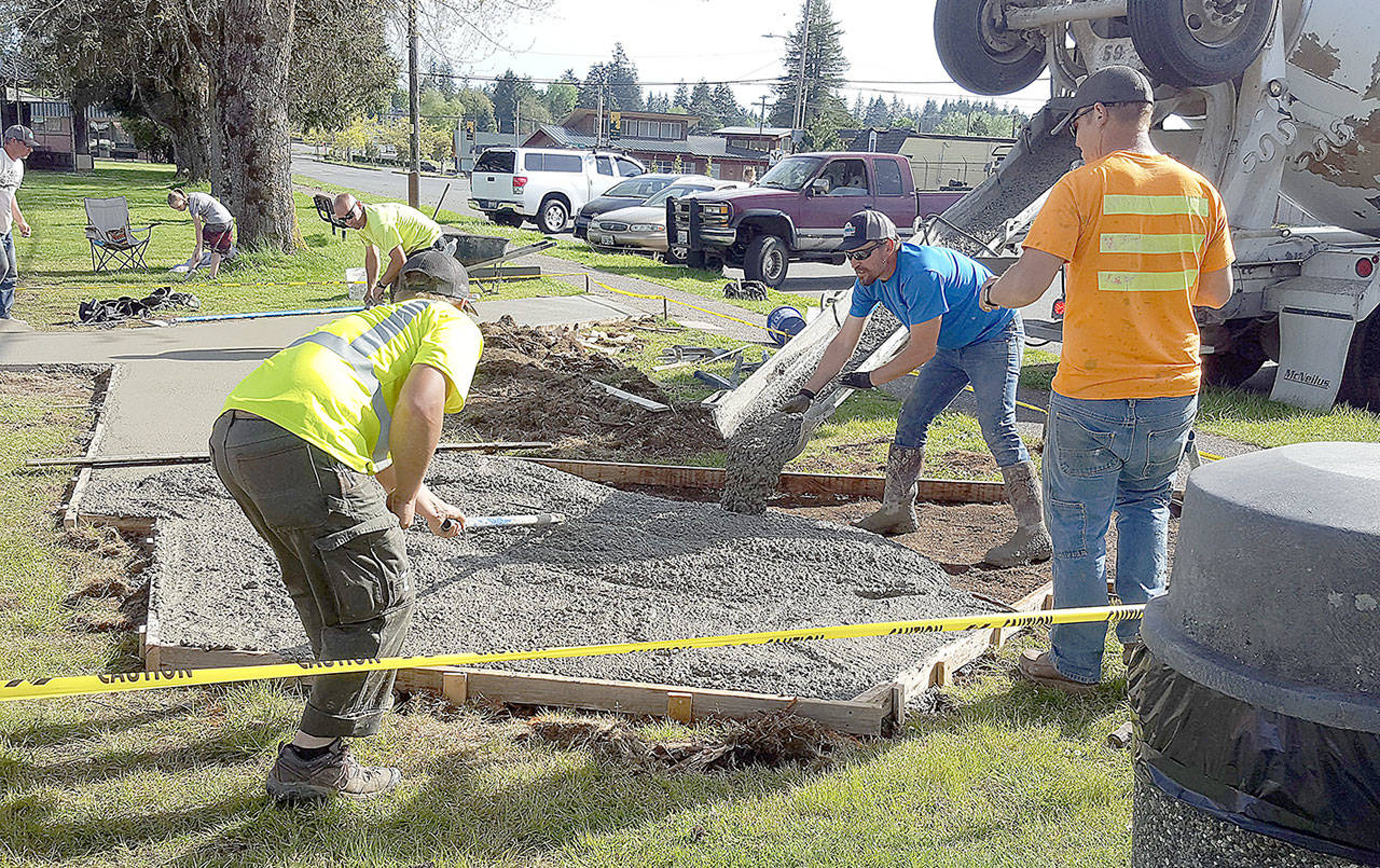 Josh Foster and his crew from Foster Brothers Inc. of Montesano laid the cement for the sidewalk at the Lindsey Baum memorial garden in McCleary.