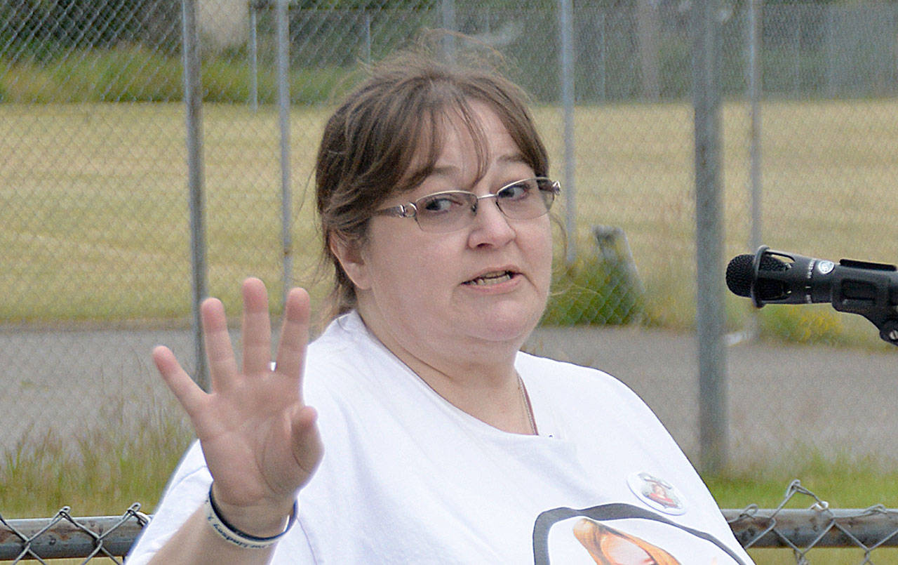 DAN HAMMOCK | GRAYS HARBOR NEWS GROUP                                Melissa Baum speaks Wednesday in McCleary at the remembrance garden dedicated to the memory of her daughter, Lindsey, who was abducted from the city in 2009.