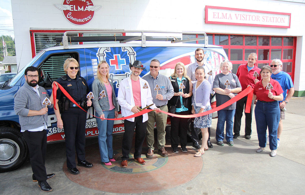Elma Chamber of Commerce Director Danny Mollas (left) holds the ribbon during a celebration June 26 of the opening of A Plumbing Doctor, a new business in Elma. With Mollas are (from left) Elma Police Chief Susan Shultz and A Plumbing Doctor co-owner Heather Wolf, co-owner Michael Walther and manager Larry Burgher. (Michael Lang | Grays Harbor News Group)