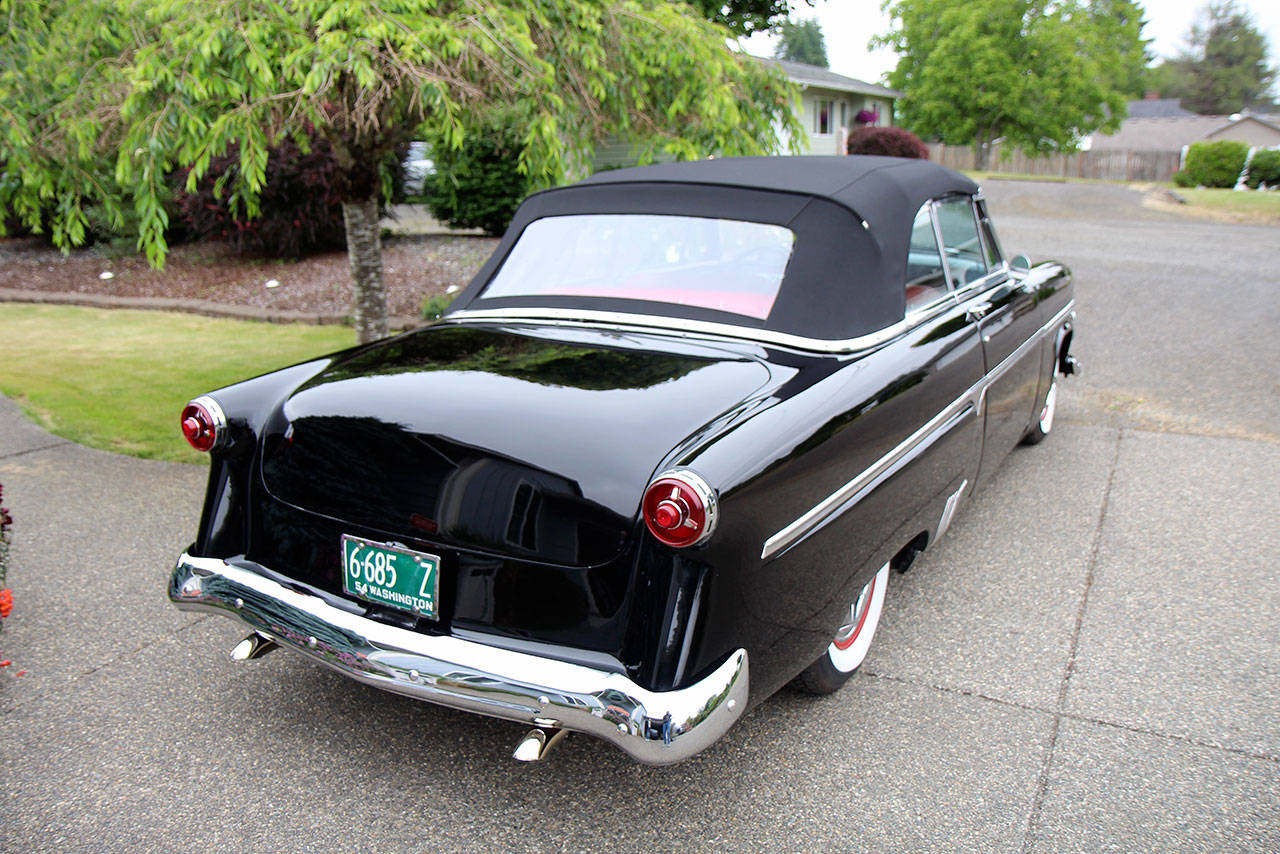 Denny Foster’s 1954 Ford Sunliner, which he restored, sits Monday, July 1, in his Montesano driveway. Foster will enter the car in the Historic Montesano Car Show, which is 8 a.m. to 3 p.m. July 20 in Monte. (Michael Lang | Grays Harbor News Group)
