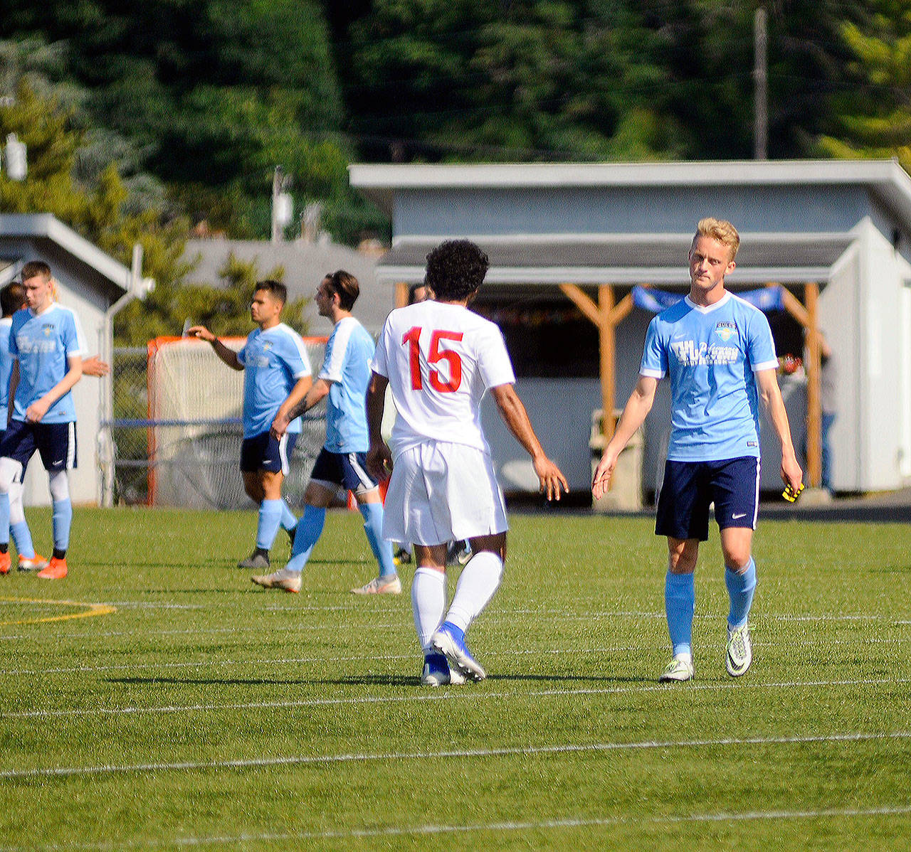 Grays Harbor’s Ben Barene, right, congratulates Redmond’s Guillermo Llamas after the final whistle on Saturday in Aberdeen. (Hasani Grayson | Grays Harbor News Group)