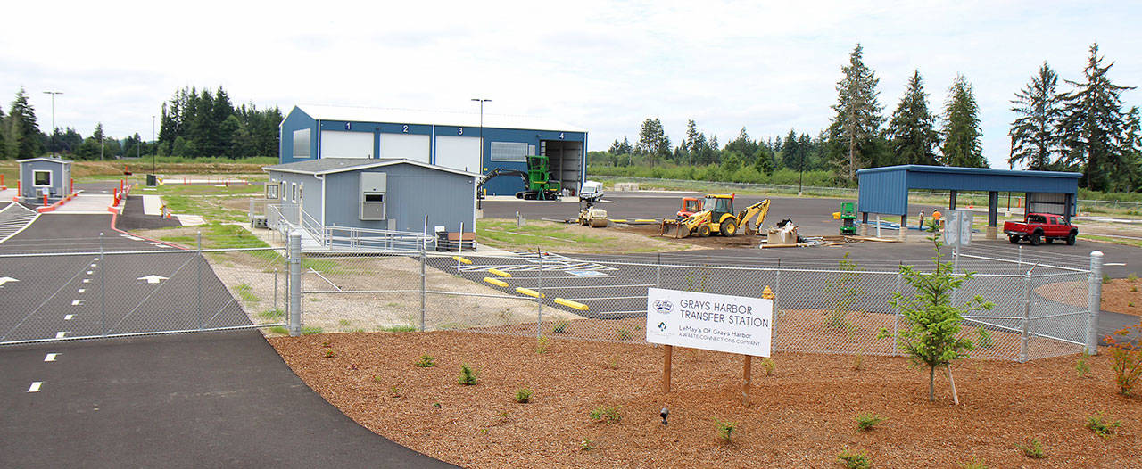 Photos by Michael Lang | Grays Harbor News Group                                LeMay’s Grays Harbor Transfer Station nears completion Friday, July 12, at 29 Gavett Lane west of Montesano. The station opens Aug. 1 near the National Guard Armory on Clemons Road. At the left are the public scales, at the right is the structure that will cover the recycling receptacles.