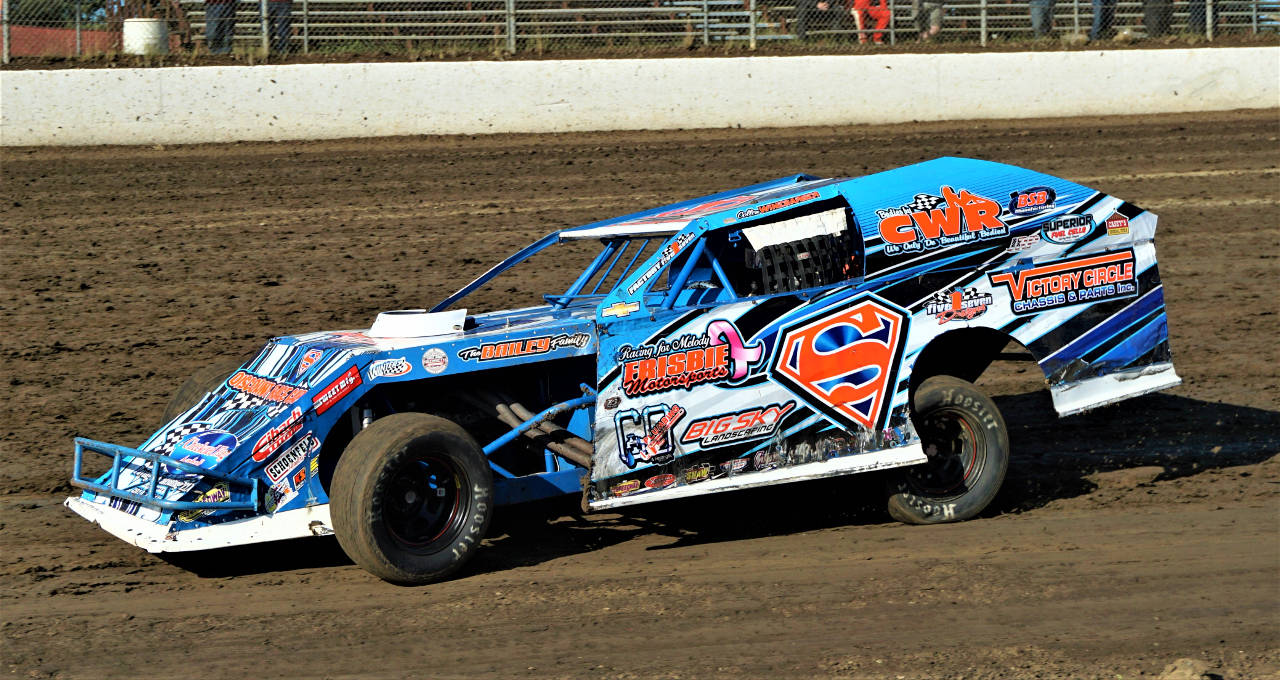 Collen Winebarger guides her modified race car to victory in the Race of Champions at Grays Harbor Raceway. (Photo by AR Racing Videos)