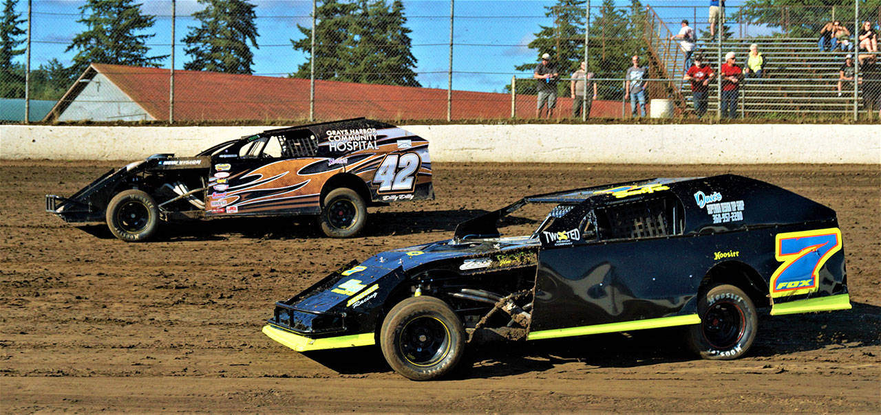 Sean Fox, left, and Kevin Hanson race in the Shipwreck Beads Modified Series at Grays Harbor Raceway on Friday. (Photo by AR Racing Videos)