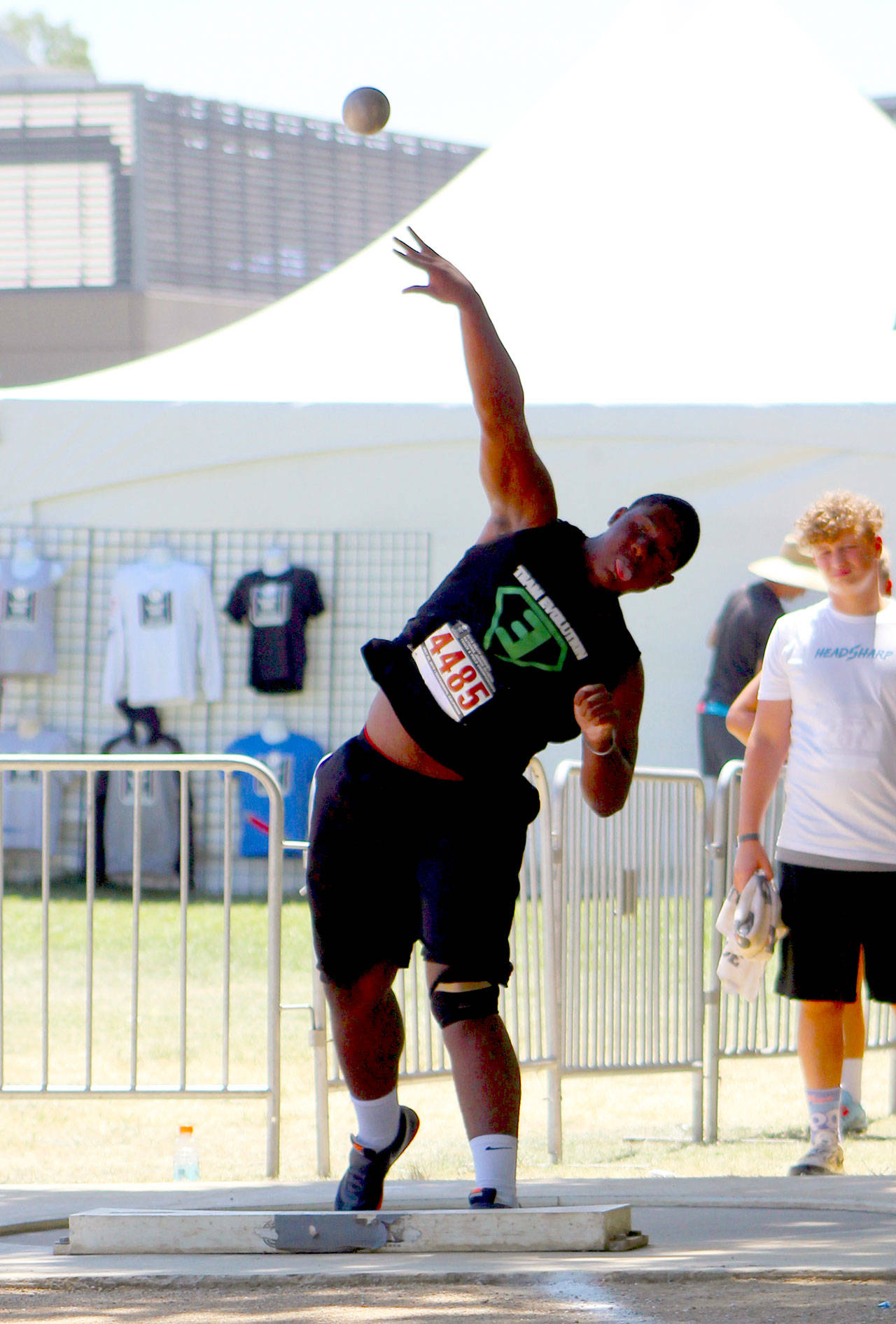 Team Evolution’s JaBron Brooks hurls a shot put during the 13-14 year-old boys competition at the USATF Junior Olympic National Championships in Sacramento, Calif. (Submitted Photo)