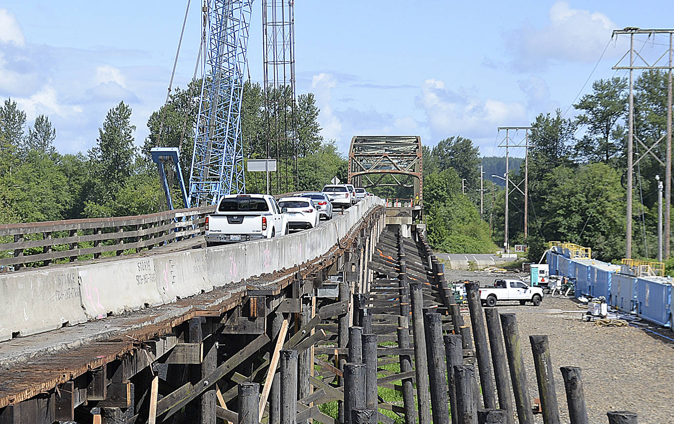 DAN HAMMOCK | GRAYS HARBOR NEWS GROUP                                The State Route 107 bridge over the Chehalis River south of Montesano is undergoing major repairs. This picture, taken July 18, shows the south approach with the exposed timber trestle that will be removed for replacement by a concrete girder bridge.
