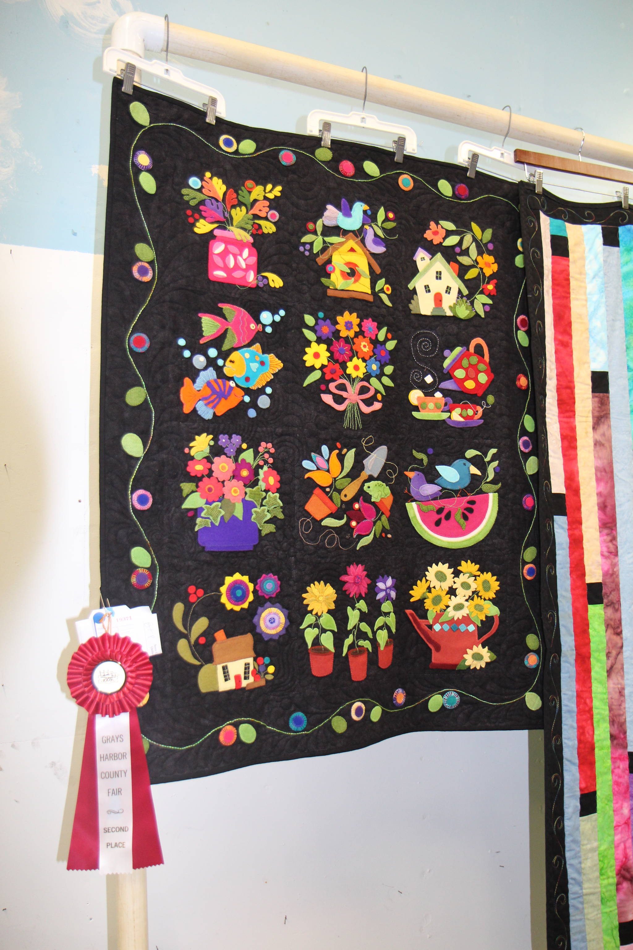 A ribbon-winning quilt hangs Monday at the Grays Harbor County Fairgrounds in Elma.