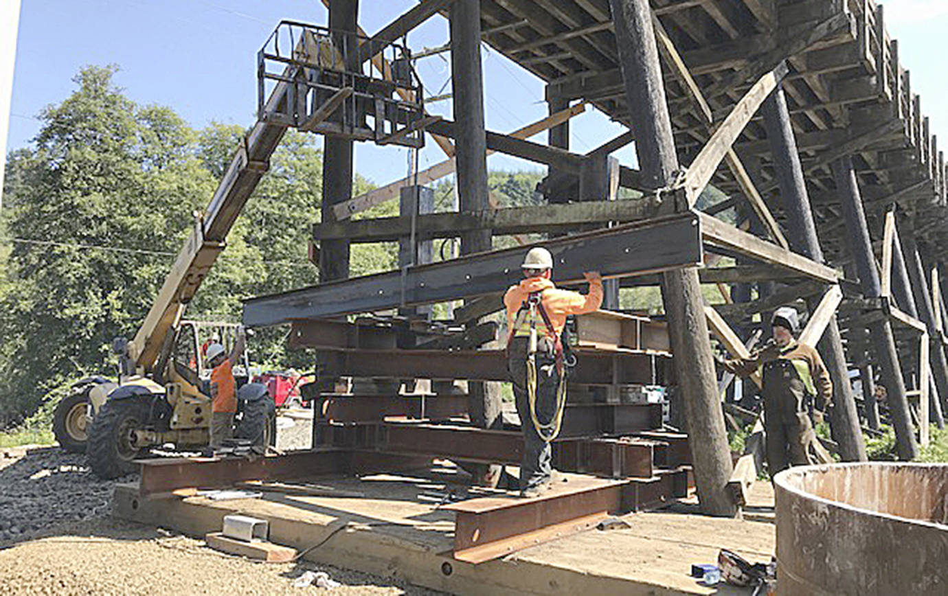 COURTESY DEPARTMENT OF TRANSPORTATION                                The timber pilings at the south approach to the State Route 107 Chehalis River Bridge are shored up with jacks and wood and steel beams as construction crews work to stabilize the bridge, which had settled up to six inches during the bridge’s rehabilitation project.