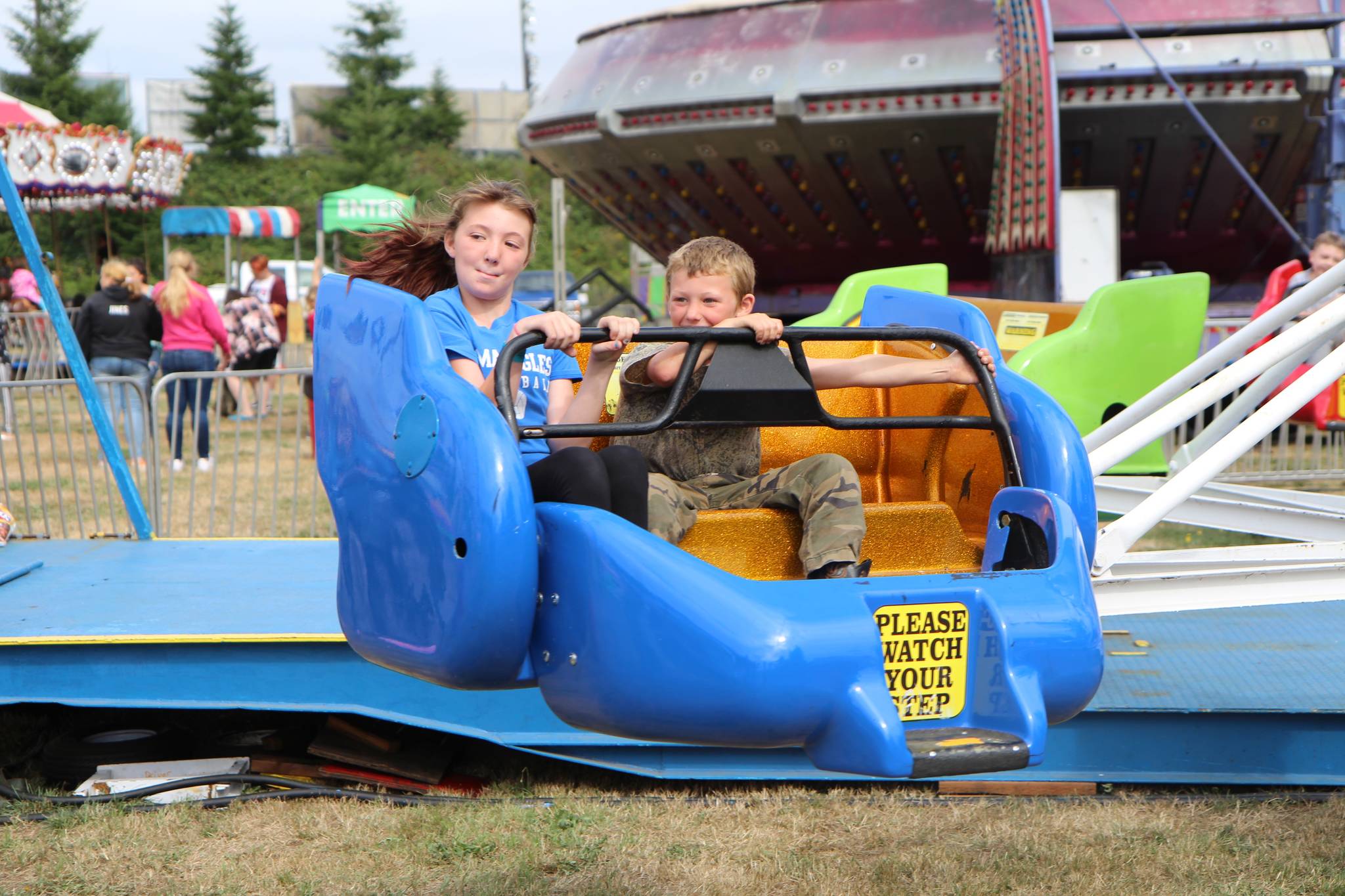 Riders go for a spin at the Fair.