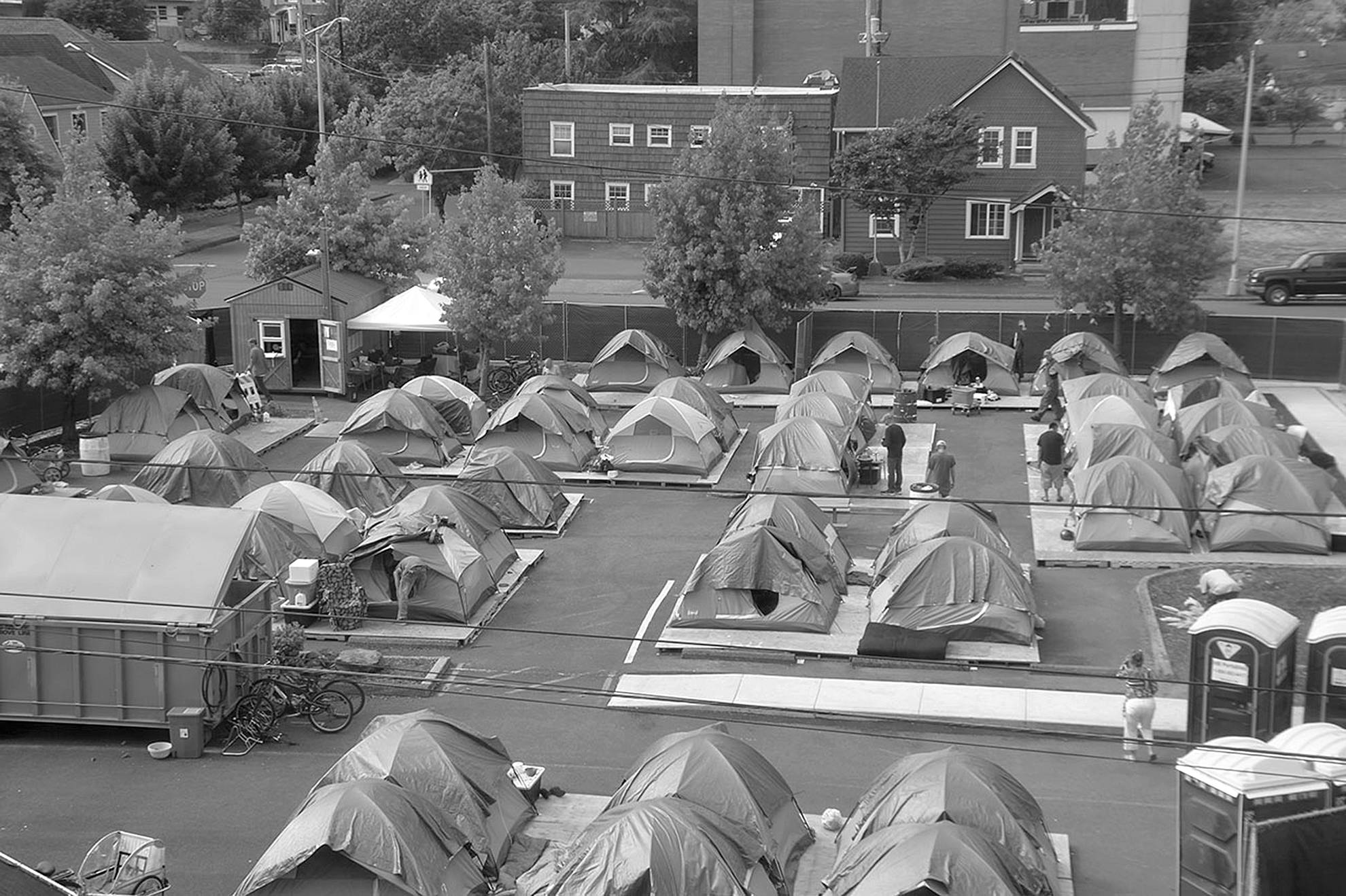 Louis Krauss | Grays Harbor News Group                                A view from Aberdeen City Hall of the temporary shelter, which is currently filled with 48 tents and over 60 people.