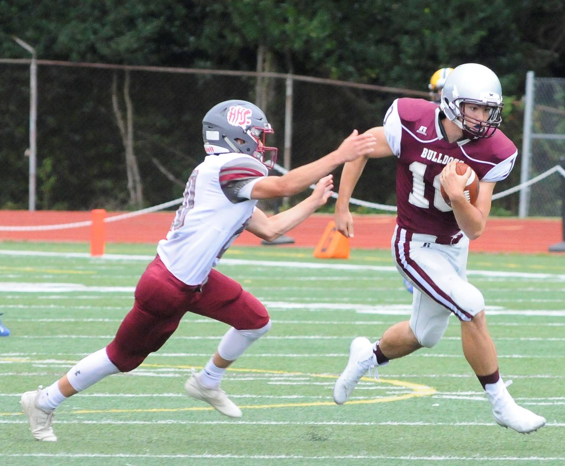 Montesano’s Trace Ridgway tries to break the tackle of Hoquiam’s Malaki Eaton at the Jamboree on Friday. (Hasani Grayson | Grays Harbor News Group)