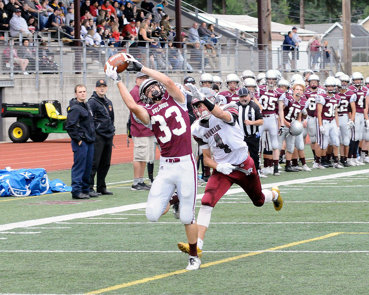 Montesano receiver Jordan King (33) catches a touchdown pass while being defended by Hoquiam’s Abraham Morales during the Jamboree at Jack Rottle Field on Friday. (Hasani Grayson | Grays Harbor News Group)