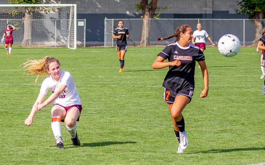 Montesano midfielder Brooke Streeter, left, scores the game-winning goal against Cashmere on Saturday at the Cashmere Soccer Field. (Photo by Shawn Donnelly)
