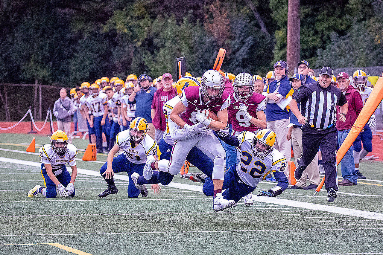 Montesano’s Sam Winter carries the football against the Aberdeen Bobcats on Friday, Sept. 6 at Jack Rottle Field in Montesano. The Bulldogs hit the road to take on Columbia-White Salmon on Friday. (Photo by Shawn Donnelly)