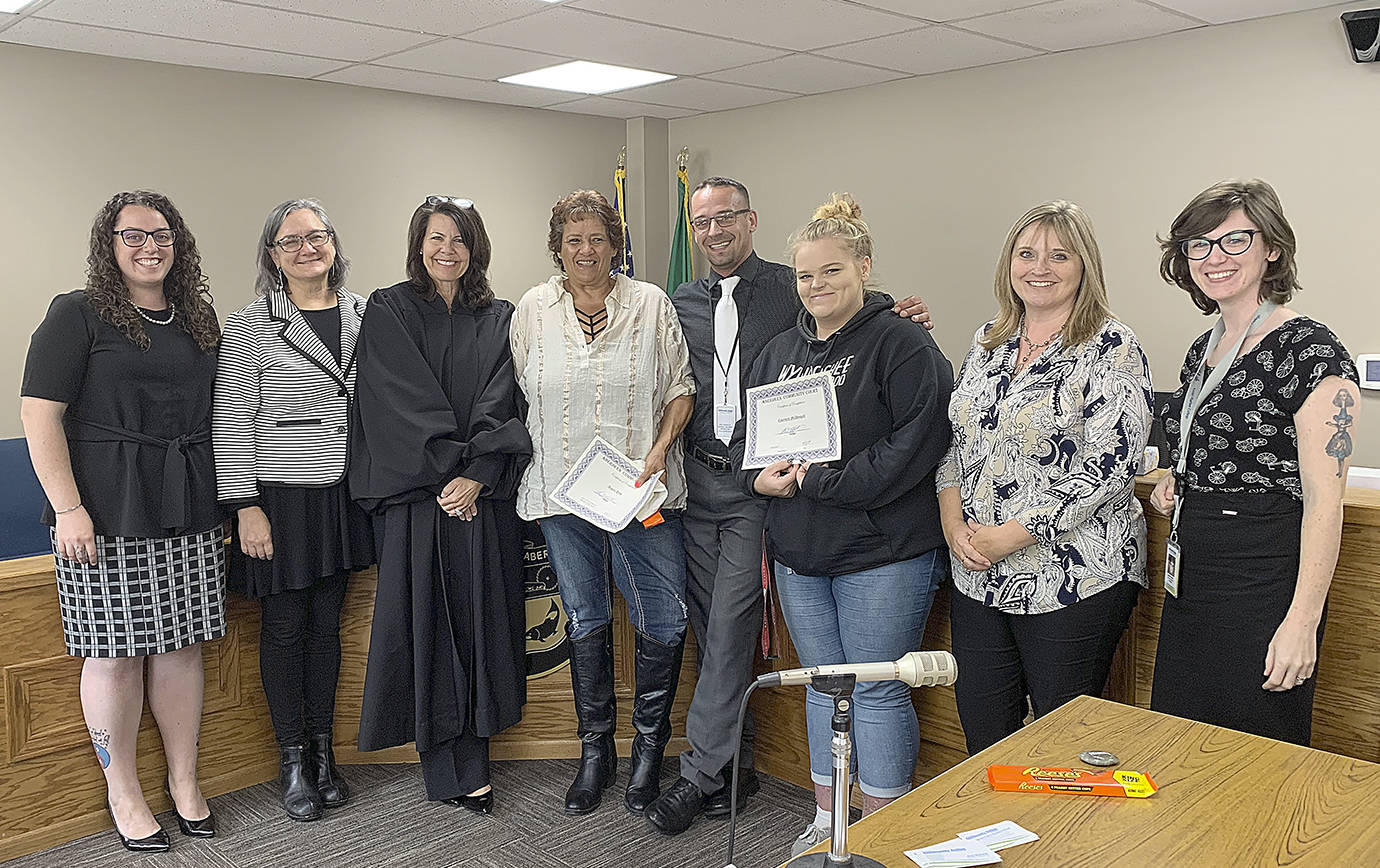 COURTESY PHOTO                                Aberdeen Community Court graduated its 100th participant Sept. 9. Pictured from left are Brittney Stephens, public defender; Patrice Kent, Aberdeen Corporation counsel; Judge Susan Solan; Angela Ping, graduate; Joey Bannish, lead judicial coordinator; Courtney McDougall, graduate; Tammy Sund, Court Administrator; and Lauren Garrett, judicial coordinator.