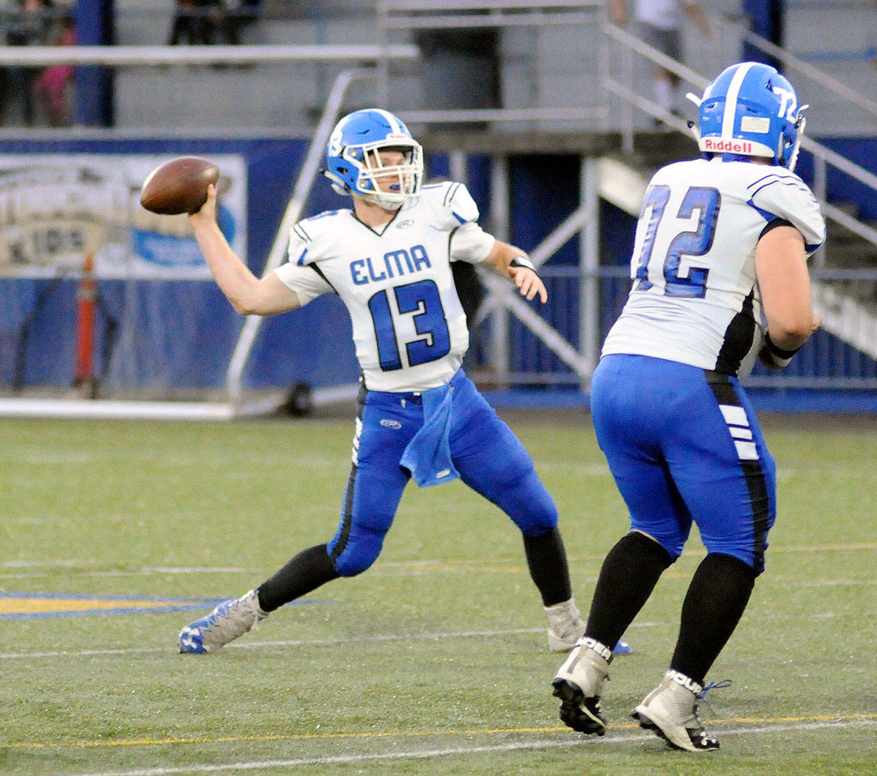 Elma’s Cody Vollan rocks back to throw a pass during a game last Friday at Stewart Field in Aberdeen. The Eagles travel to take on the Castle Rock Rockets on Friday. (Ryan Sparks | Grays Harbor News Group)