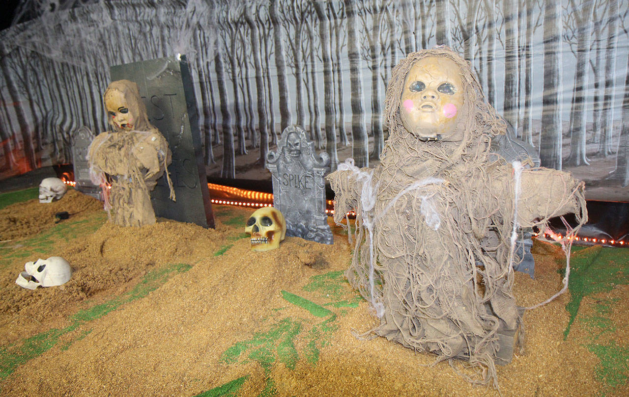 Michael Lang | Grays Harbor News Group                                Scares, including this graveyard, wait for those brave enough to enter the Frightmare in Elma haunted house, which is put on the Elma Chamber of Commerce, at the fairgrounds.