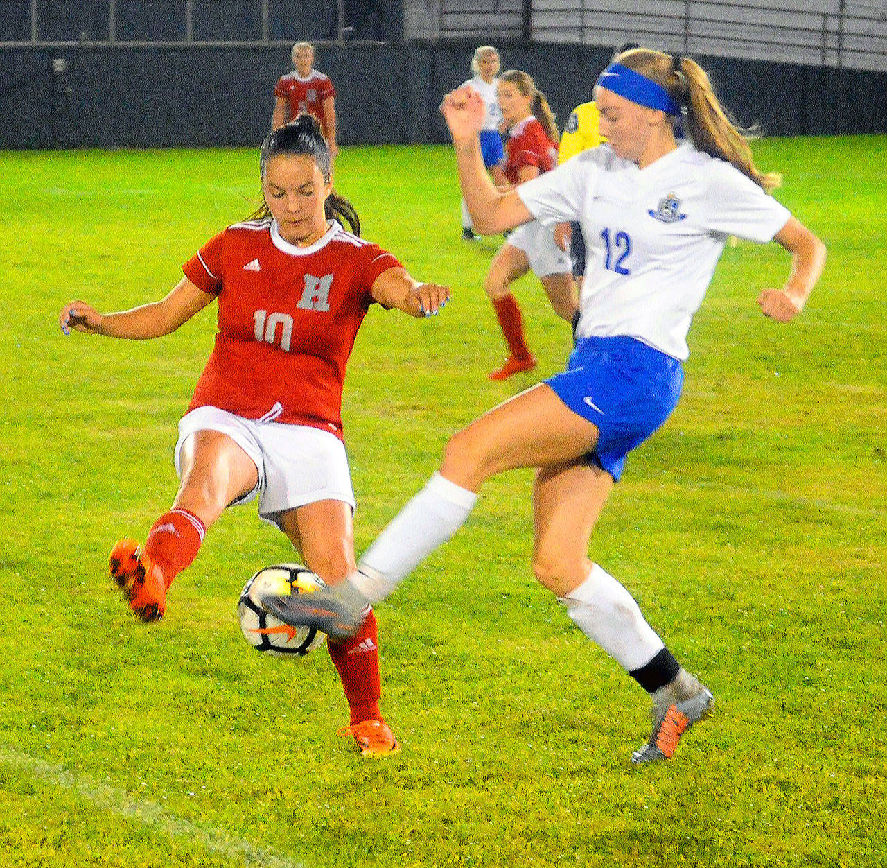 Elma’s Jillian Bieker, right, controls a pass while defended by Hoquiam’s Kylie Bell in the first half on Thursday at Olympic Stadium in Hoquiam. Bieker scored the game-winning goal on a free kick in the 78th minute to give Elma a 2-1 victory. (Hasani Grayson | Grays Harbor News Group)