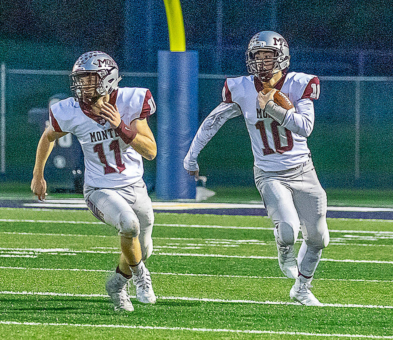 Montesano quarterback Trace Ridgway (10) carries the football while running back Brent Hollatz blocks in a game against Forks on Oct. 4. Montesano faces Hoquiam in a critical 1A Evergreen League game on Friday in Montesano. (Photo by Shawn Donnelly)