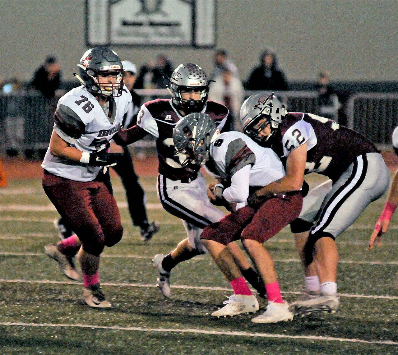 Montesano defensive lineman Tanner Nicklas (52) sacks Hoquiam quarterback Dane McMillan during the first half of the Bulldogs’ 48-0 victory on Friday at Jack Rottle Field in Montesano. (Hasani Grayson | Grays Harbor News Group)