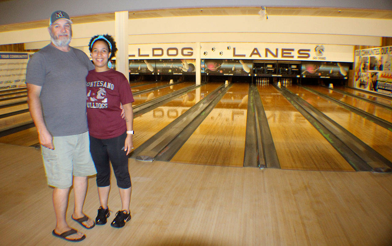 (The Vidette file) Todd Hoiness and Brooke Chapman-Hoiness pose for a picture in August 2018 shortly before the reopening of their bowling alley, Bulldog Lanes, in Montesano. Chapman-Hoiness said this week that the bowling alley would close Friday, Oct. 25.