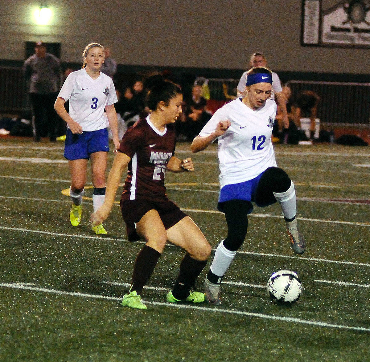 Elma’s Jillian Bieker (12) protects the ball from Montesano’s Vanna Prom late in the second half of a match on Thursday at Jack Rottle Field. (Hasani Grayson | Grays Harbor News Group)