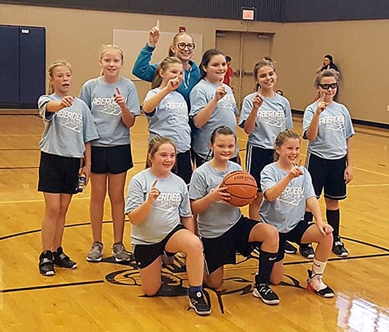 The Central Park Cougars (bottom row, from left): Kensie Ervin, Sawyer Shoemaker, Sophia Knutson. Top row (from left): Rylee Hendrickson, Wendy Neil, Hadley Durr, Vanessa Lopez, Alyssa Yakovich, Ella Daniels and Coach Elizabeth Martinez (background). (Submitted photo)