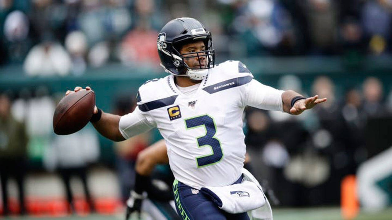 Seahawks QB Russell Wilson is one of the front-runners for the NFL MVP this season as he has guided Seattle to a 9-2 record. (Tribune News Service)