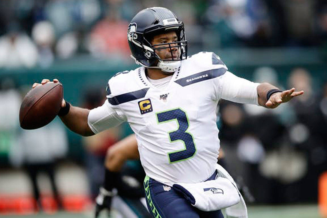 Where does Wilson’s MVP-caliber season rank among the best in Seattle sports history?