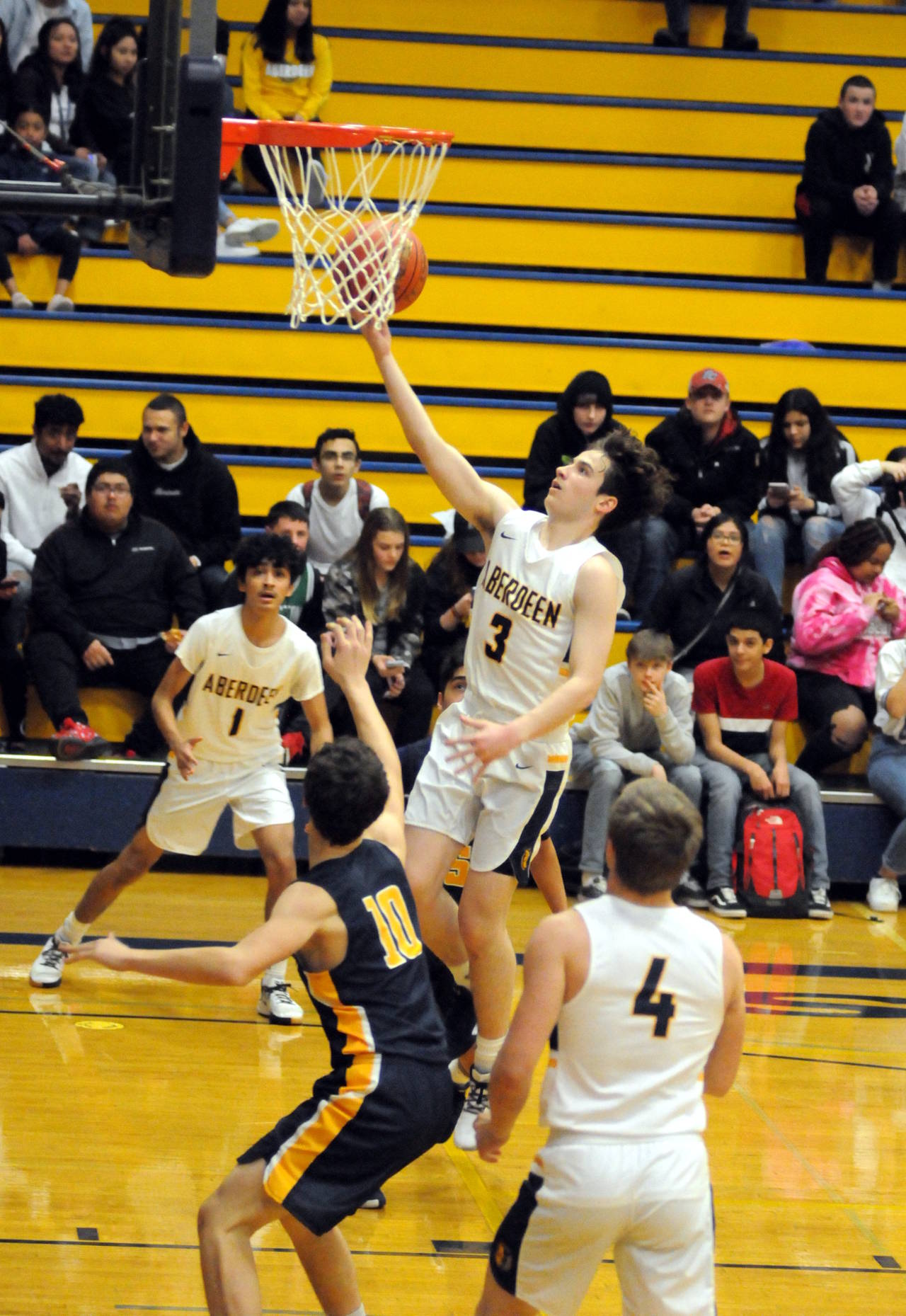 Aberdeen’s Griffin Kinkade (3) rises for a layup in the first quarter of the Bobats’ 65-54 loss to Forks on Friday at Sam Benn Gym in Aberdeen. (Ryan Sparks| Grays Harbor News Group)