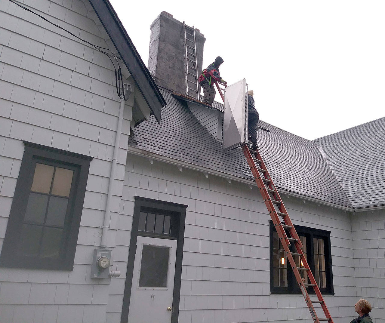 Workers recently stabilized the chimney at the new home of the McCleary Historical Society. The former home of the United Methodist Church was damaged in the 2001 Nisqually Earthquake. The bricks of the chimney were encased and stabilized, and a chimney topper was added to keep the rain out. “It is now a solid chimney and should last a long time,” columnist Linda Thompson, who is a leader of the historical society, reported.                                 Photo courtesy Linda Thompson