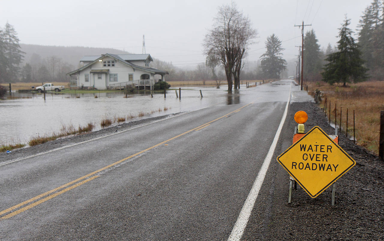 A house is surrounded by floodwaters Tuesday (Jan. 7, 2020) along the Mox-Chehalis Road near Porter, Washington. Grays Harbor Emergency Management advises drivers to turn around when they see water over a roadway. The National Weather Service in Seattle issued a flood warning for the Chehalis River on Tuesday morning. (Michael Lang | Grays Harbor News Group)