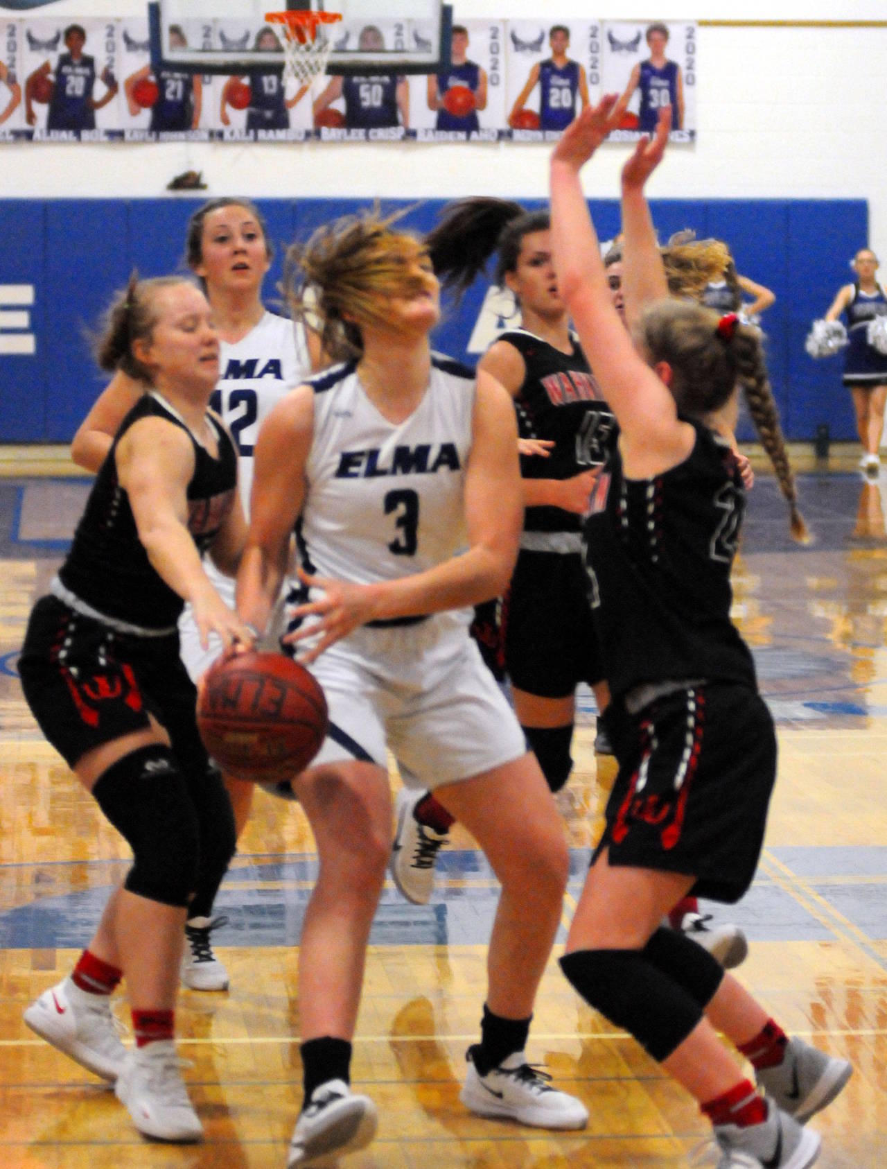 Elma’s Jalyn Sackrider is surrounded by Wahkiakum defenders during the Eagles’ 56-45 loss on Wednesday in Elma. (Ryan Sparks | Grays Harbor News Group)
