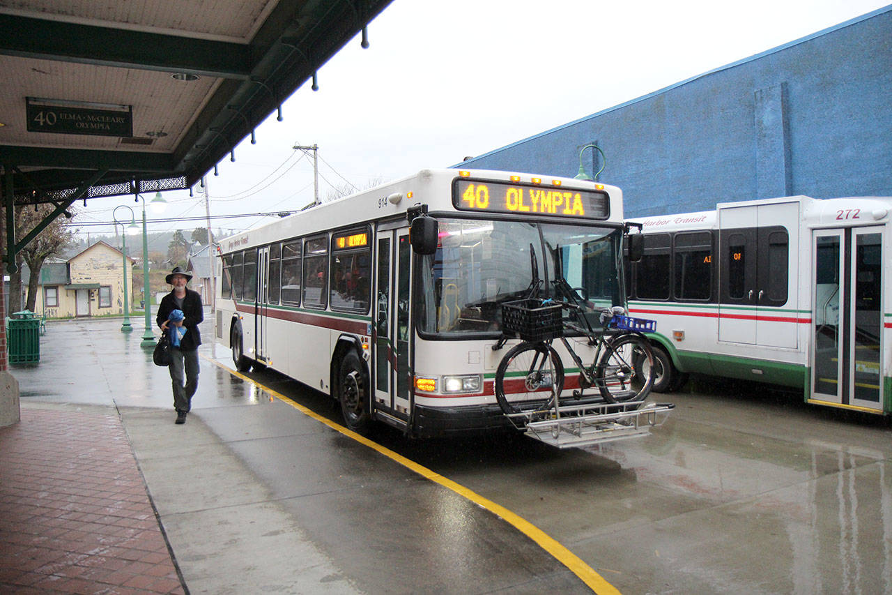 A rider walks away from a Grays Harbor Transit bus headed toward Olympia on Thursday (Jan. 30, 2020) at the Montesano Station. GH Transit is considering expanding express service to Olympia and constructing park and ride lots along U.S. Highway 12/state Route 8. (Michael Lang | Grays Harbor News Group)