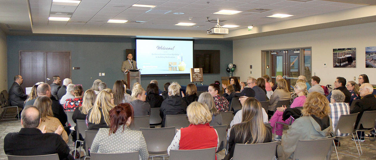 Josh Martin, Summit Pacific Medical Center CEO, speaks to a crowd Friday, Jan. 31, 2020 at a celebration marking the year anniversary of the opening of the Summit Pacific Wellness Center in Elma. (Michael Lang | Grays Harbor News Group)