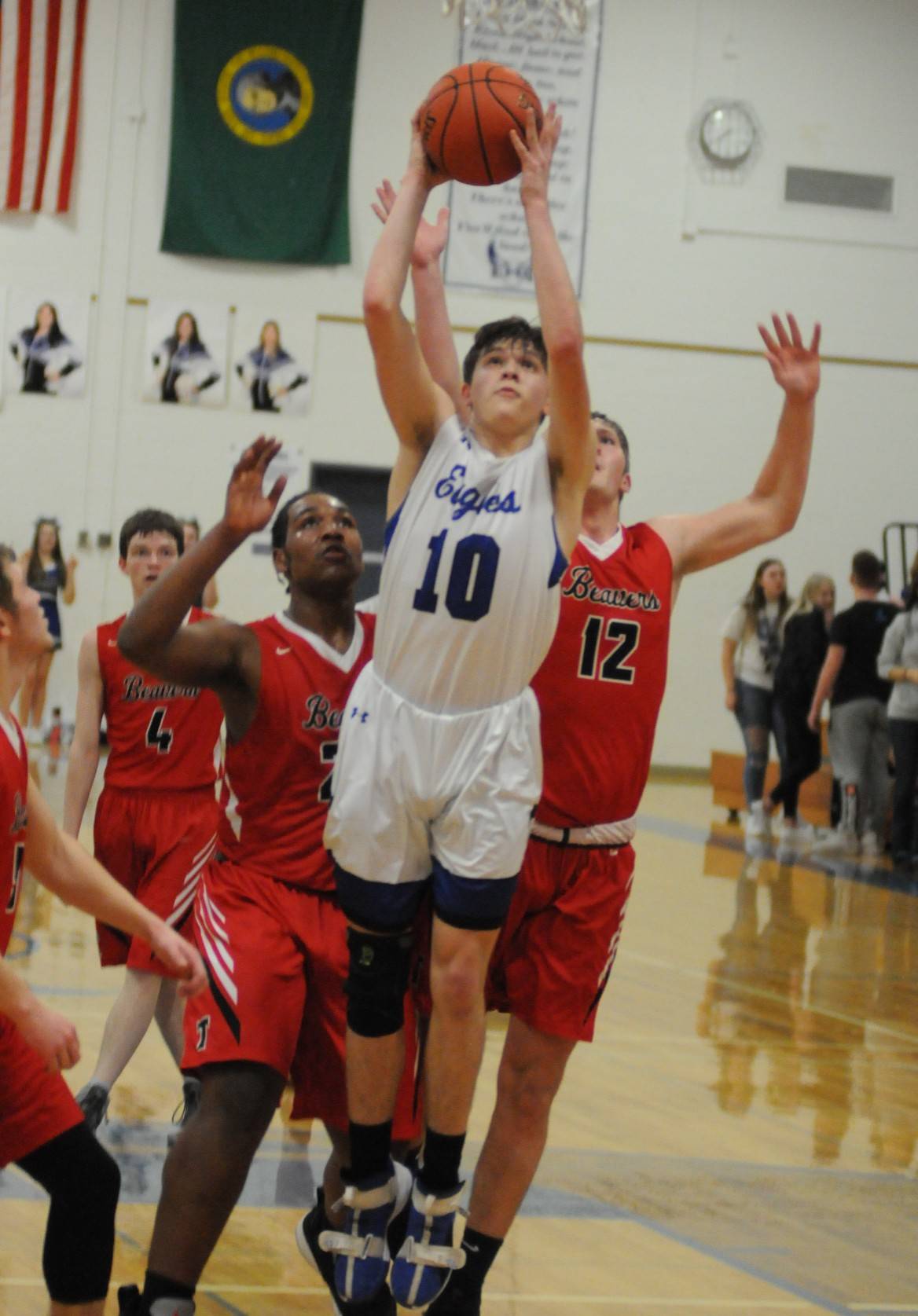 Ryan Sparks | Grays Harbor News Group                                Elma’s Cobey Moore (10) is fouled by Tenino’s Paxton Russell (12) in the first half of the Eagles’ 65-48 win on Jan. 30 at Elma High School.