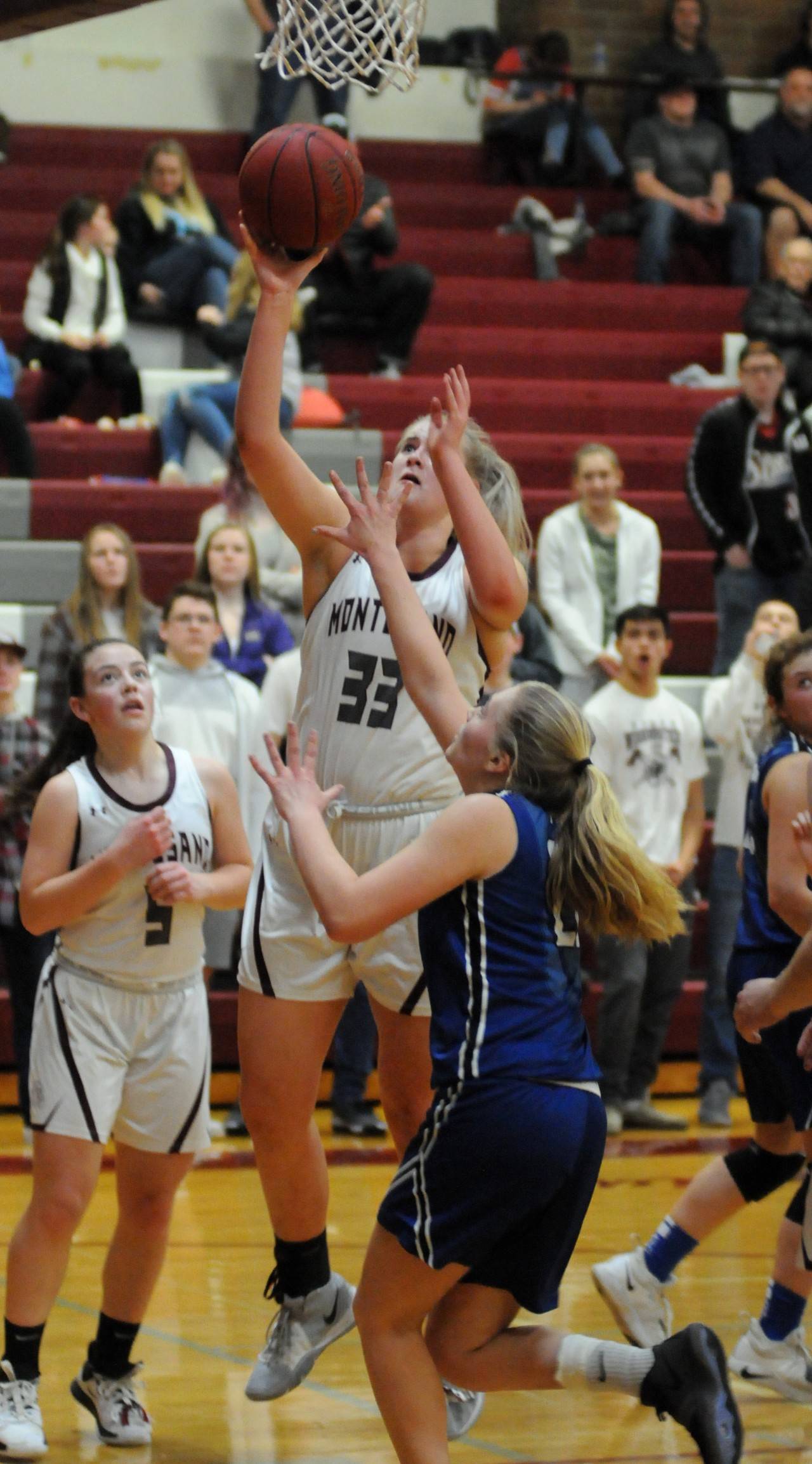 Montesano’s Zoe Hutchings (33) scores during the second half of Elma’s 60-52 victory over Montesano on Friday in Montesano. (Ryan Sparks | Grays Harbor News Group)