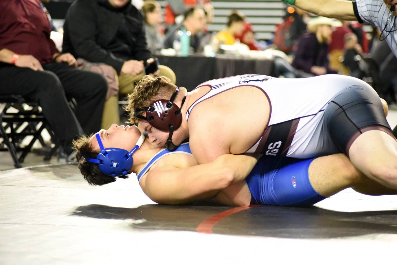 Montesano’s Kenny Koonrad pins Dylan Davis of South Whidbey to take third in the state in the 1A 285-pound class at the Mat Classic XXXII state-championship meet on Saturday at the Tacoma Dome. (Photo by Sue Michalak Budsberg)