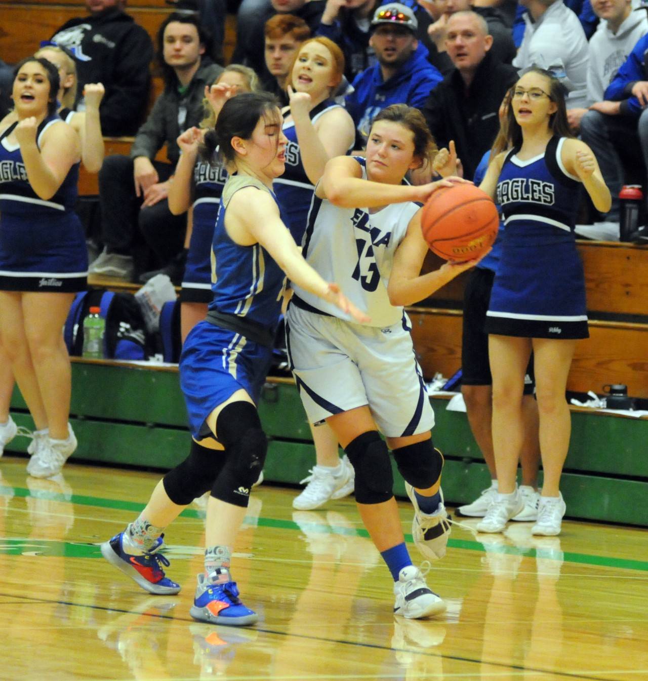 Elma’s Kali Rambo, right, is defended by Deer Parks Havelah Fairbanks during Saturday’s 1A regional round game at Tumwater High School. (Ryan Sparks | Grays Harbor News Group)