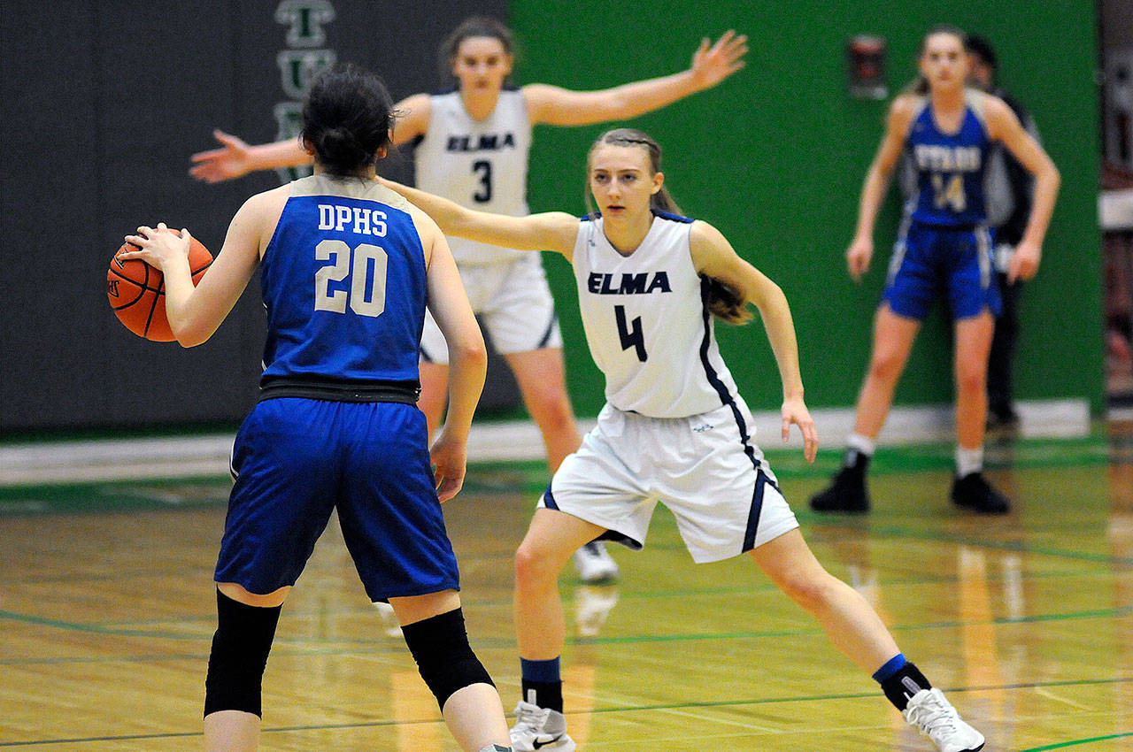 Elma point guard Jillian Bieker (4) stares down Deer Park’s Havelah Fairbanks during a 1A Regionals game on Saturday, Feb. 29 at Tumwater High School. Bieker’s steal and subsequent free throw in the game’s final moments proved to be the difference in Elma’s 39-38 victory. (Ryan Sparks | Grays Harbor News Group)