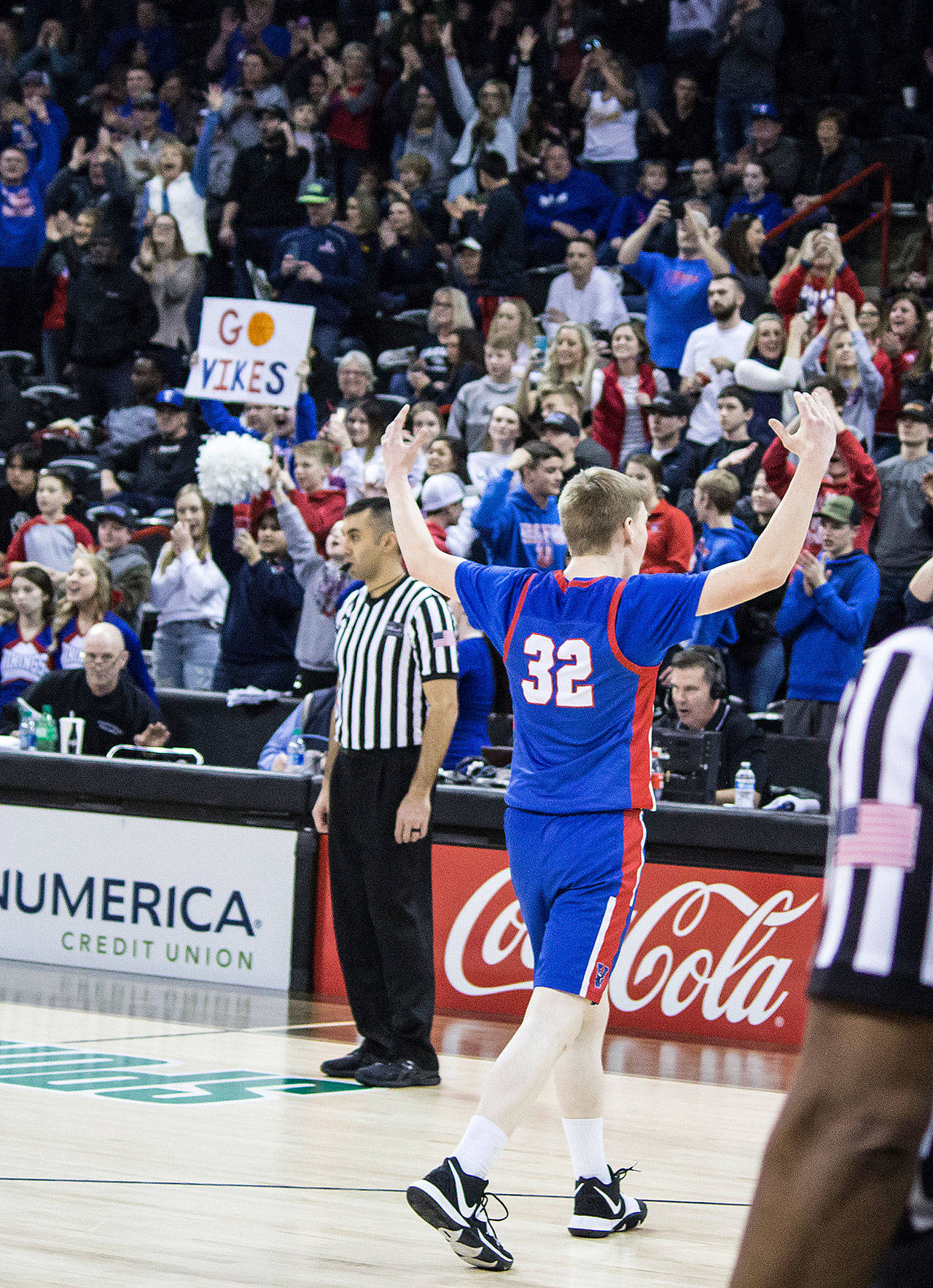 Willapa Valley’s Allen Deniston walks off the court as Vikings fans celebrate a 71-62 win over Liberty in the 2B State Basketball Tournament on Friday, March 5. (Brandon Hanson | Chewelah Independent)