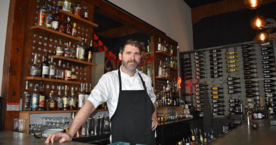 Rediviva’s owner and Chef Andy Bickar proudly stands behind his bar, his staff and his food. The 2000 Aberdeen High School graduate crafts locally-sourced food in such a way that guests leave full and happy. Matthew N. Wells | The Daily World