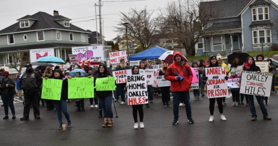 The messages the crowd in support for Oakley Carlson, the missing 5 year old from Oakville, weren’t just audible. The approximate 100 people who showed up on Saturday, Feb. 26, 2022 brought signs for a visual flair, as they did during the first two gatherings for the little girl back in December 2021 and January 2022. Matthew N. Wells | The Daily World