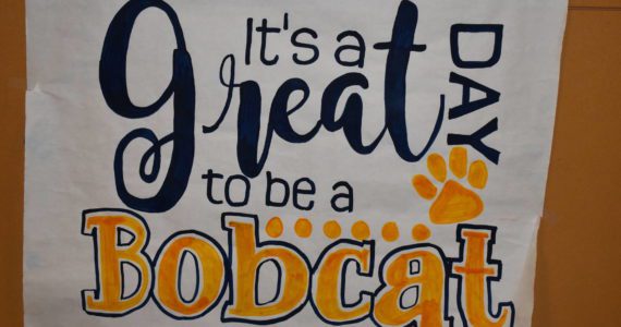 “It’s a great day to be a Bobcat,” is written and colored-in, with school colors, on a sign that hangs just inside the main entrance to Aberdeen High School Matthew N. Wells | The Daily World