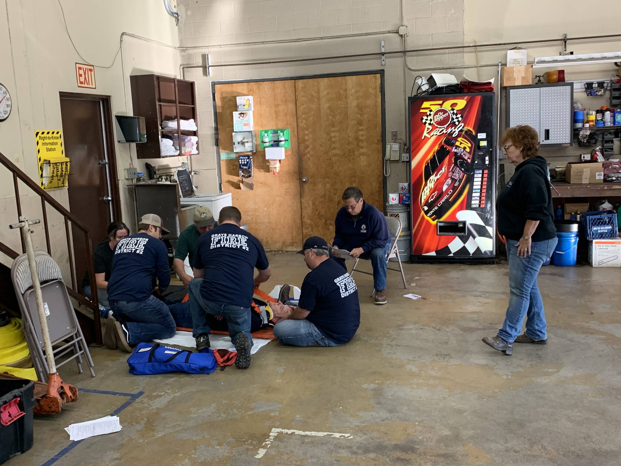 Certified GHEMS instructors teach a spinal immobilization class at Grays Harbor Fire District #2. Embedded instructors do not receive financial compensation through the department for their instruction, and must also maintain their own up-to-date certifications to teach. Photo courtesy of Louisa Schreier