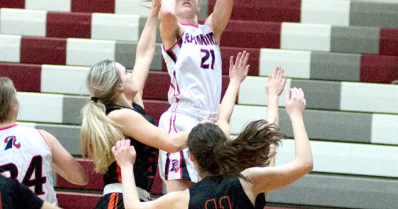 DAILY WORLD I FILE PHOTO Raymond senior guard Kyra Gardner (21), seen here in a game against Rainier on Feb. 8, 2022, was named the Gatorade Girls Basketball Player of the Year for the state of Washington on Wednesday.