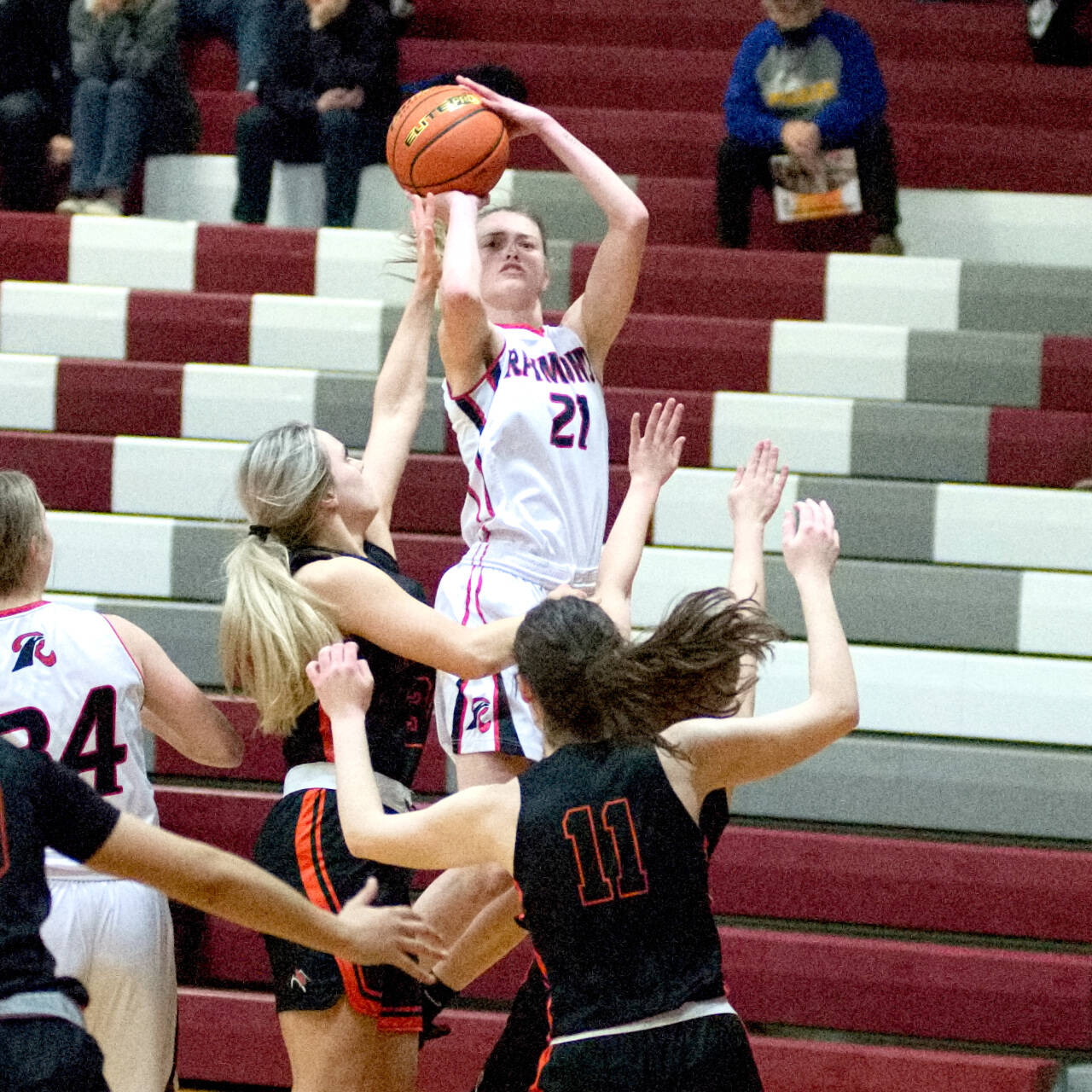 DAILY WORLD I FILE PHOTO Raymond senior guard Kyra Gardner (21), seen here in a game against Rainier on Feb. 8, 2022, was named the Gatorade Girls Basketball Player of the Year for the state of Washington on Wednesday.