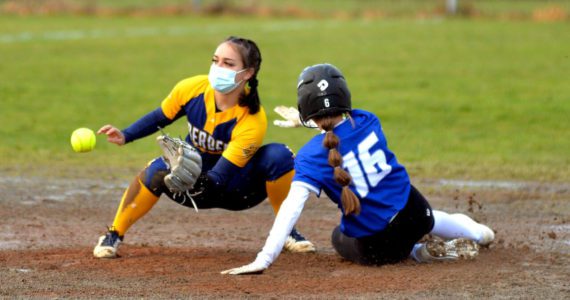 RYAN SPARKS | THE DAILY WORLD Elma’s Mia Monroe (16) steals second base ahead of the tag from Aberdeen shortstop Hailey Wilson during the Bobcats’ 6-1 victory over the Eagles on Saturday in Elma.