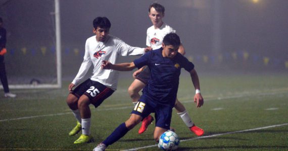 RYAN SPARKS | THE DAILY WORLD Aberdeen junior Carlos Mendoza (15) maneuvers against Centralia defender Cesar Ruiz Nino (25) during the Bobcats’ 4-0 win on Tuesday at Stewart Field in Aberdeen.